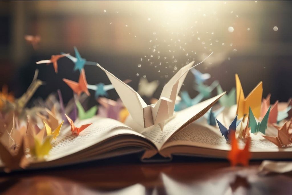 open book with page folded into an origami bird